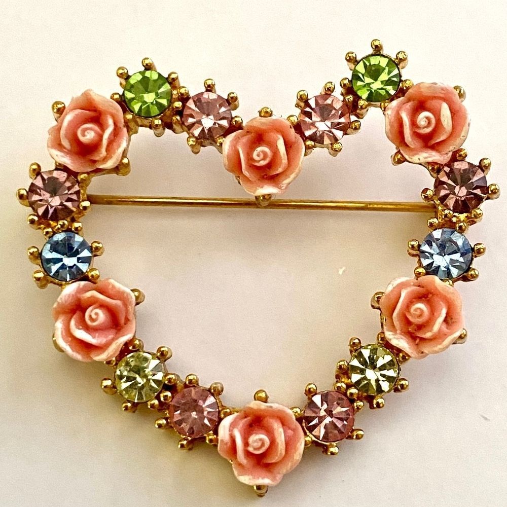 1990s vintage Avon goldtone heart brooch with roses and multicolored rhinestones